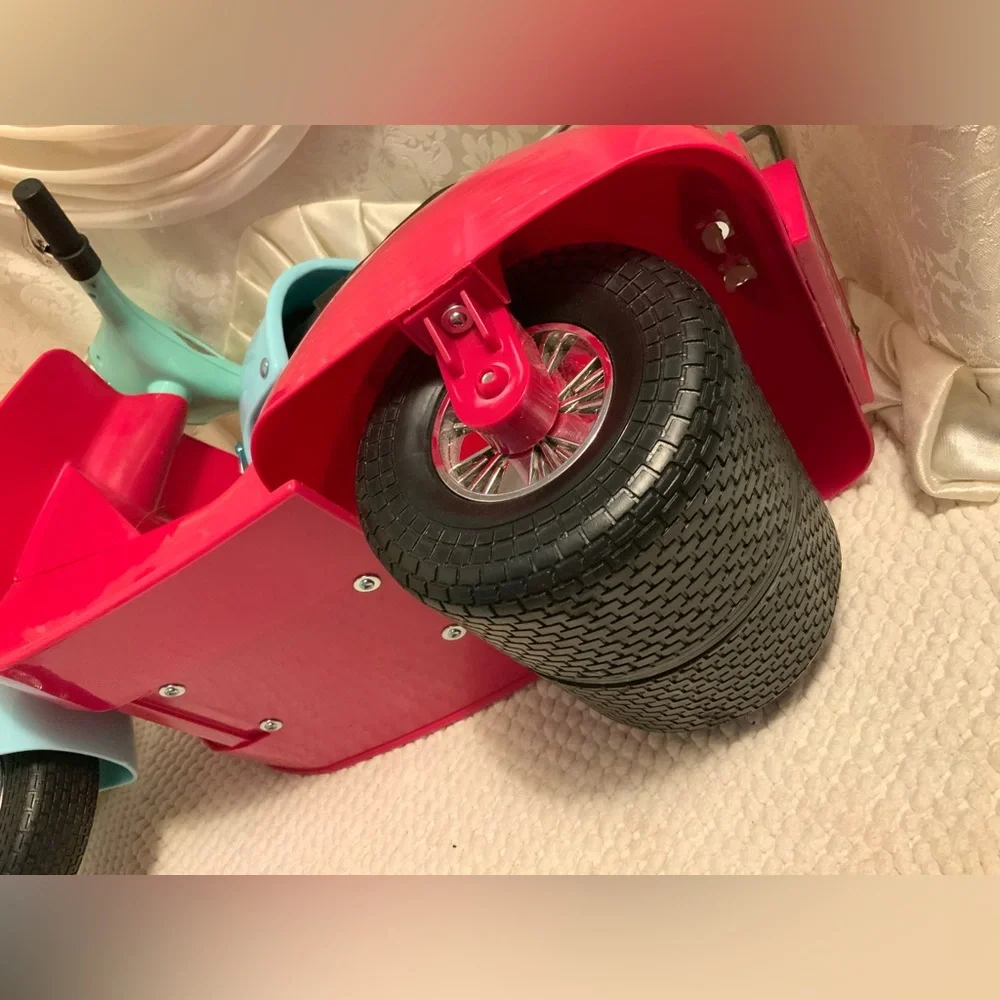 TOY SCOOTER AND HELMET BY BATTAT INC.